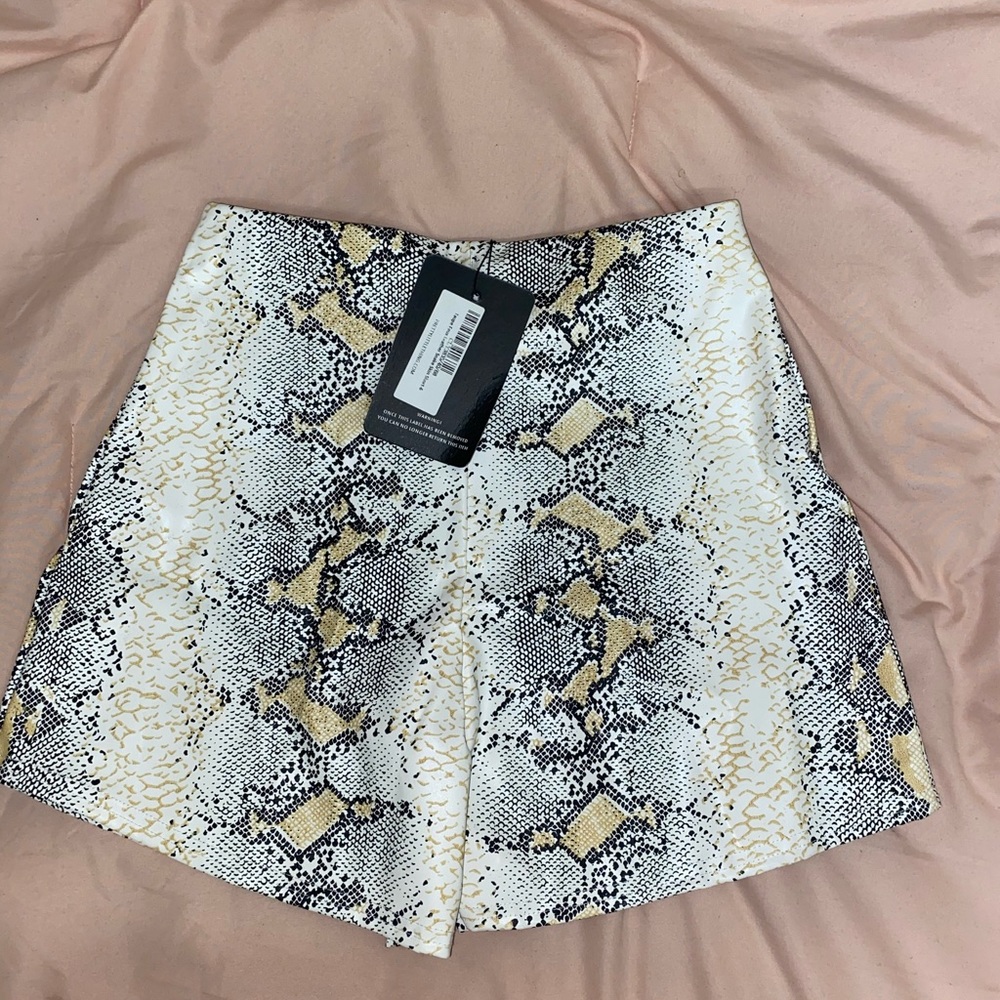 Snake print faux leather shorts